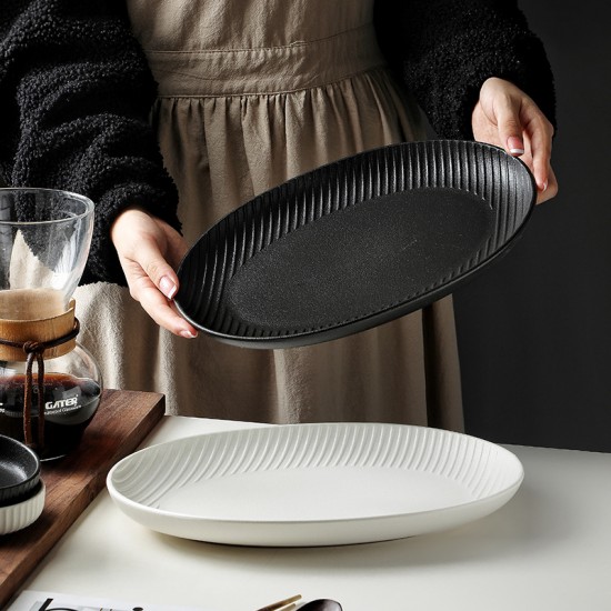 Vaisselle en céramique de style japonais premium sense hotel nub steak plate wholesale retro noir et blanc western assiette assiette de repas maison