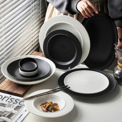 Vaisselle en céramique de style japonais premium sense hotel nub steak plate wholesale retro noir et blanc western assiette assiette de repas maison