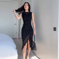 Spot-on wholesale of thin silk summer women's clothing with leopard print, featuring a plunging neckline, asymmetrical cut, and suspender straps.