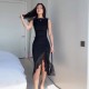 Spot-on wholesale of thin silk summer women's clothing with leopard print, featuring a plunging neckline, asymmetrical cut, and suspender straps.